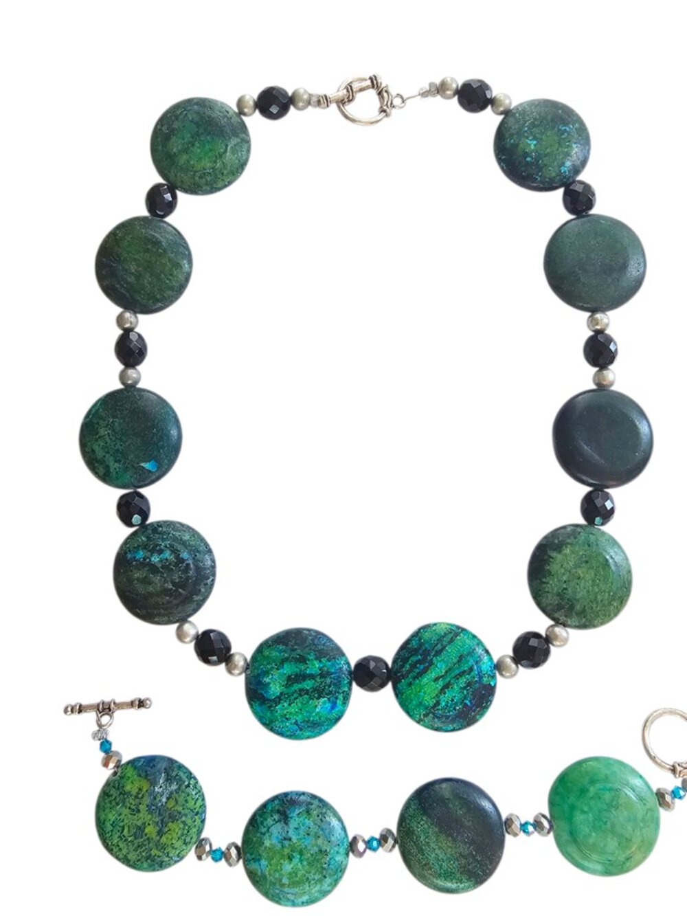 A jewelry set consisting of a necklace and a bracelet, crafted from natural